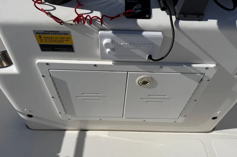Slide: The Image of Control panel of 2008 Tidewater 2100 Bay Max boat with capacity label. - 14