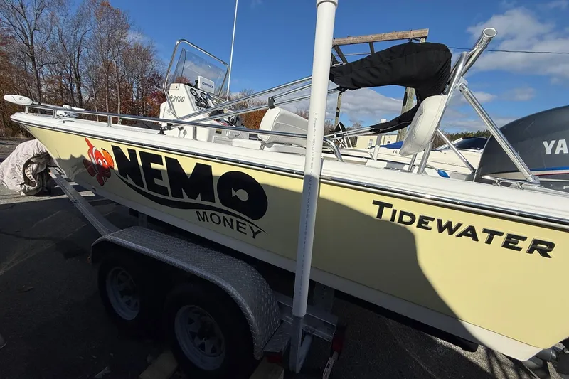 Slide: The Image of 2008 Tidewater 2100 Bay Max boat on trailer, featuring "Nemo Money" graphic. - 3