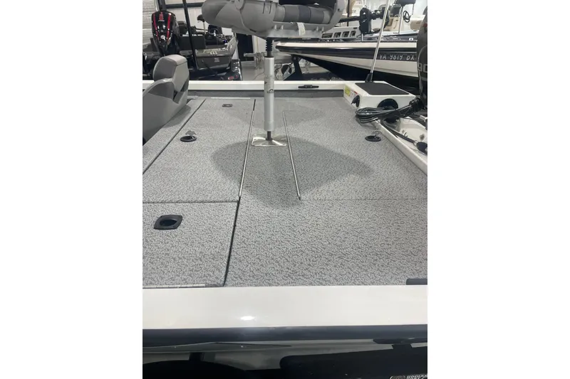 Slide: The Image of 2022 G3 Sportsman 1710 Vinyl boat interior with gray deck and seating. - 5