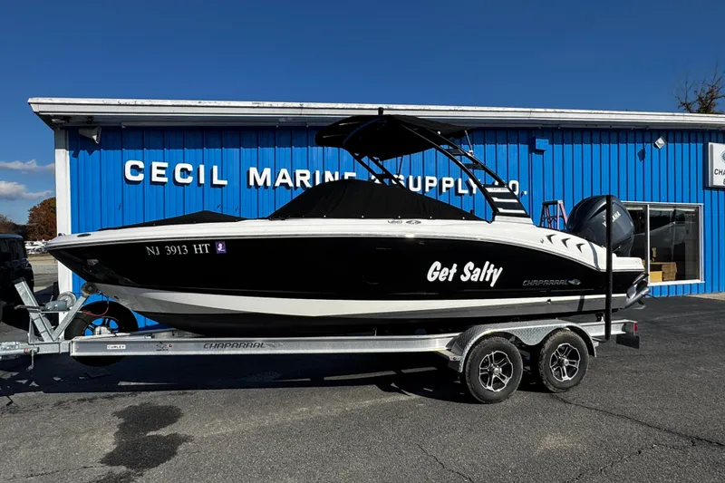 The Image of 2024 Chaparral 21 SSi OB boat on trailer outside Cecil Marine Supply. - 1
