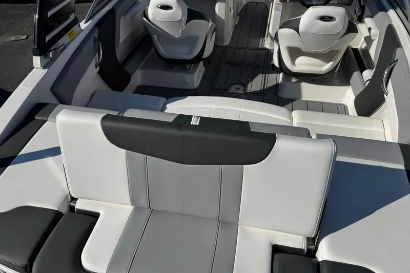 Slide: The Image of 2024 Chaparral 21 SSi OB boat interior with stylish seating and modern design. - 22
