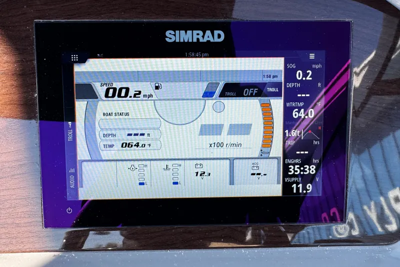 Slide: The Image of Simrad display on 2024 Chaparral 21 SSi OB showing speed, depth, and engine data. - 23