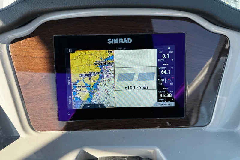 Slide: The Image of Simrad display on 2024 Chaparral 21 SSi OB showing navigation and engine data. - 25