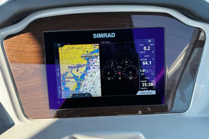 Slide: The Image of Simrad display on 2024 Chaparral 21 SSi OB showing navigation and engine data. - 26