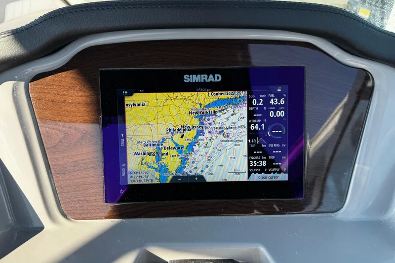 Slide: The Image of Simrad navigation display on 2024 Chaparral 21 SSi OB boat dashboard. - 27