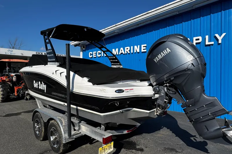 Slide: The Image of 2024 Chaparral 21 SSi OB boat with Yamaha outboard motor at marine supply store. - 3