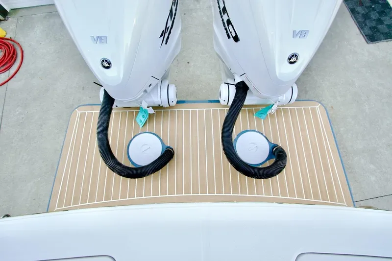 Slide: The Image of Twin V8 engines on a 2026 Regulator 31 boat, viewed from above. - 28