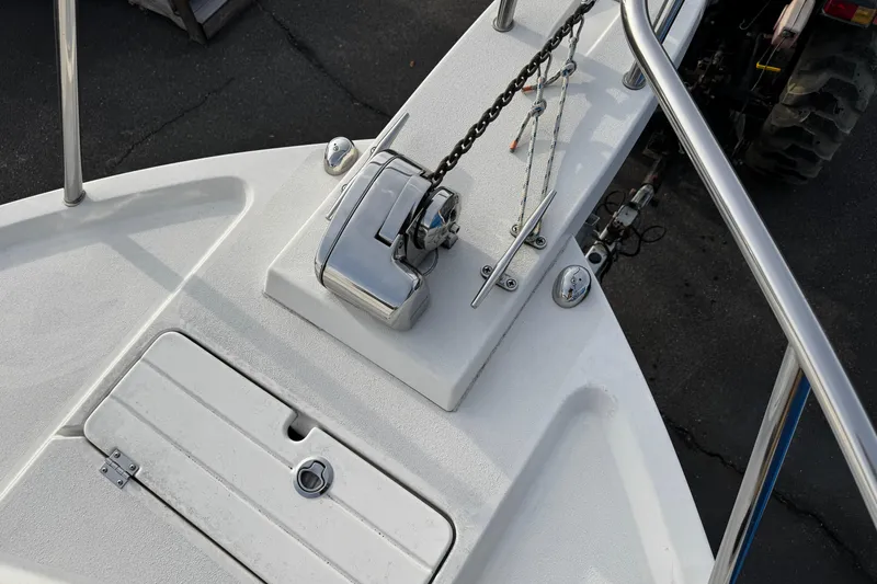 Slide: The Image of 2018 Parker 2520 XLD Sport Cabin boat deck with anchor chain and winch. - 11