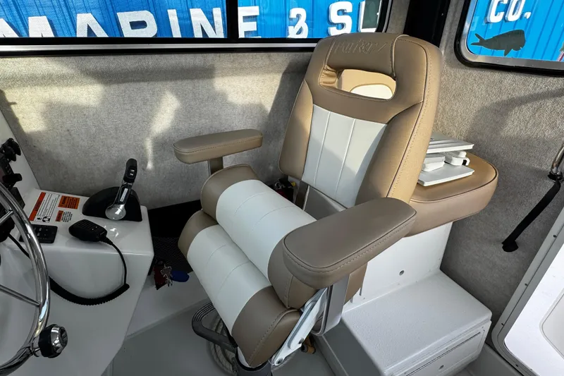 Slide: The Image of Captain's chair in 2018 Parker 2520 XLD Sport Cabin boat interior. - 24
