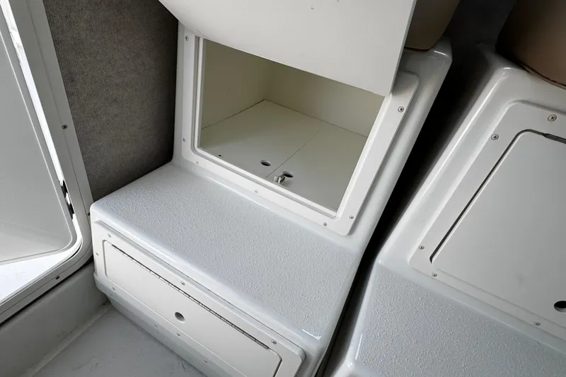 Slide: The Image of 2018 Parker 2520 XLD Sport Cabin interior storage compartment, white finish. - 28