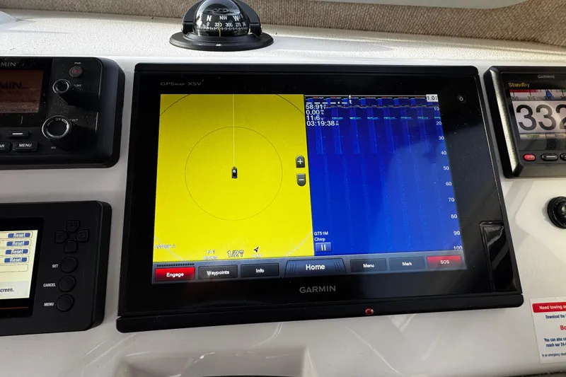 Slide: The Image of Garmin navigation system on 2018 Parker 2520 XLD Sport Cabin boat dashboard. - 34