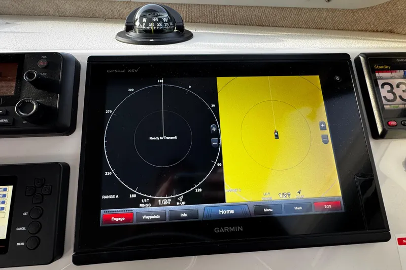 Slide: The Image of Garmin GPS display on 2018 Parker 2520 XLD Sport Cabin boat dashboard. - 35