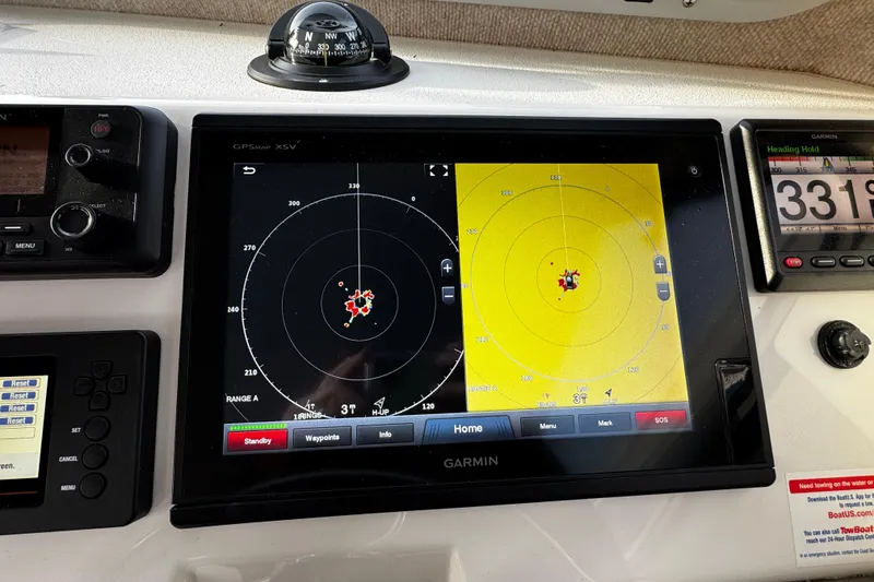 Slide: The Image of Garmin GPS display on 2018 Parker 2520 XLD Sport Cabin boat dashboard. - 36