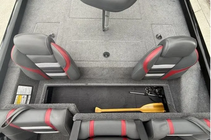 Slide: The Image of 2021 Ranger RT178 boat interior with storage compartment and seating. - 19