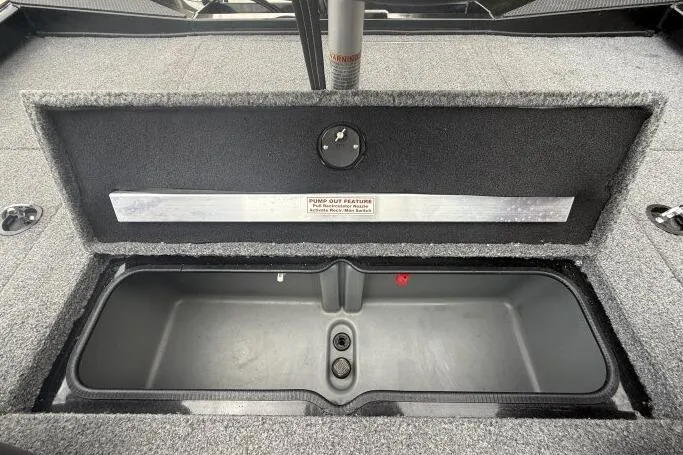 Slide: The Image of 2021 Ranger RT178 boat storage compartment with pump-out feature, open lid view. - 20