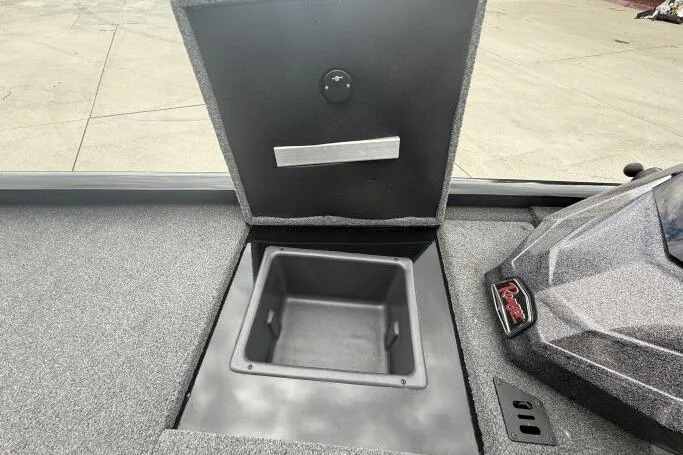 Slide: The Image of 2021 Ranger RT178 boat storage compartment with open lid, showcasing interior space. - 25