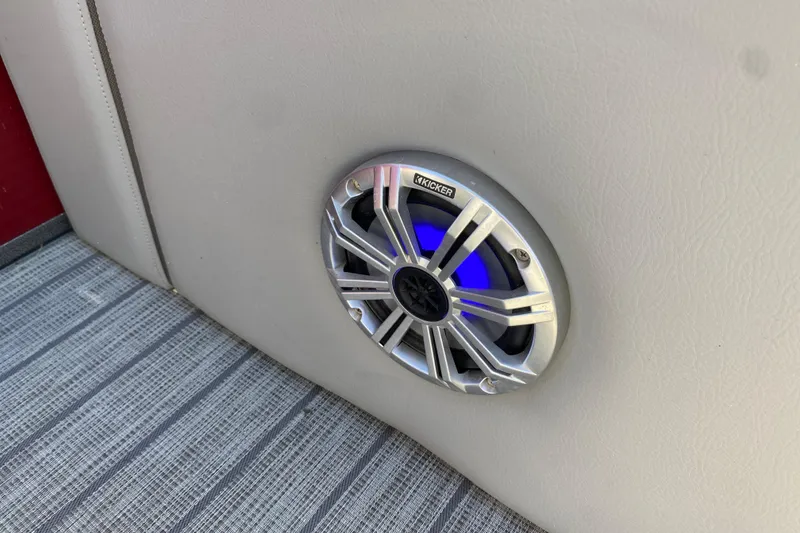 Slide: The Image of Kicker speaker on 2020 Manitou 25 Oasis SR SHP boat interior. - 27