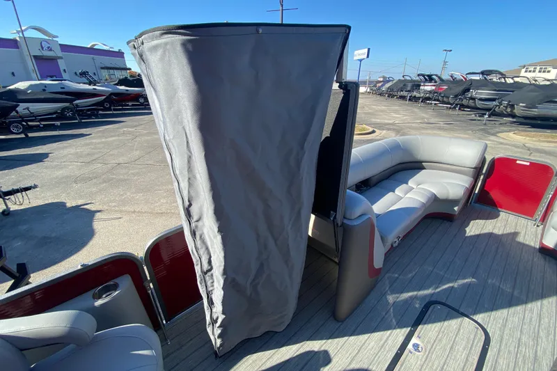 Slide: The Image of 2020 Manitou 25 Oasis SR SHP pontoon boat with seating and privacy curtain. - 32