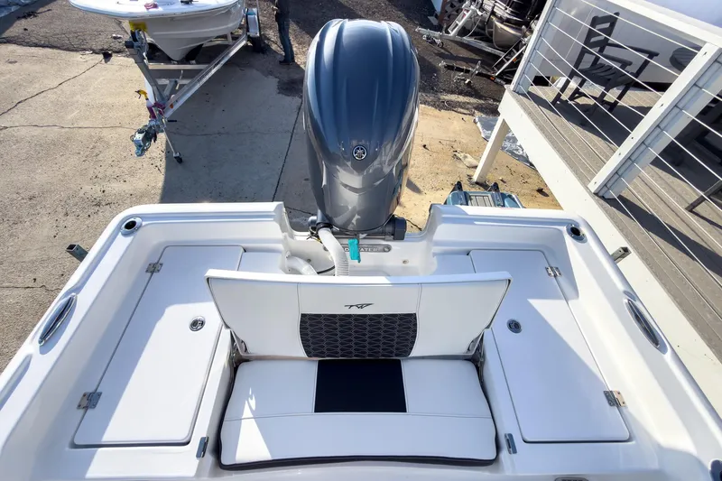Slide: The Image of 2026 Tidewater 2210 Carolina Bay boat with outboard motor, viewed from above. - 22