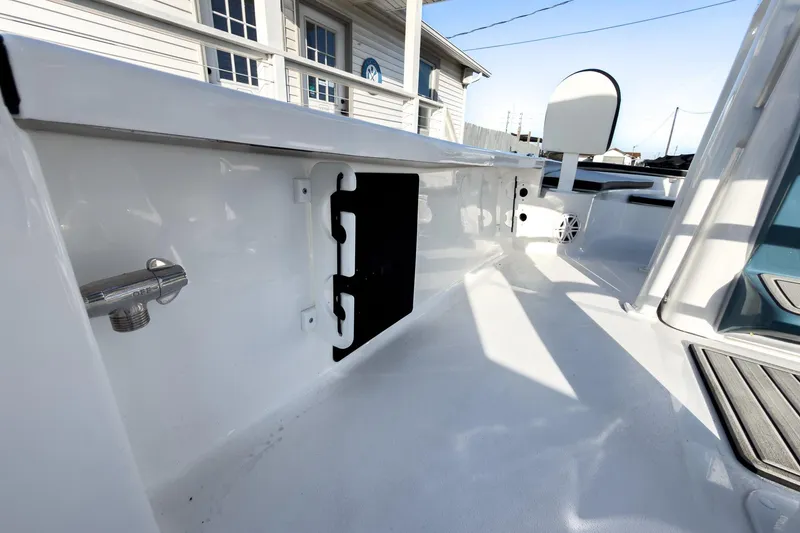 Slide: The Image of 2026 Tidewater 2210 Carolina Bay boat interior, showcasing sleek design and modern features. - 25