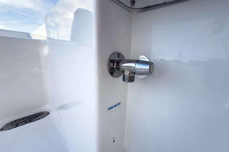 Slide: The Image of 2026 Tidewater 2210 Carolina Bay boat raw water outlet detail. - 26