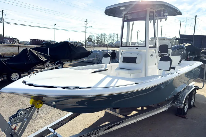 Slide: The Image of 2026 Tidewater 2210 Carolina Bay boat on trailer, sleek design, ready for adventure. - 3