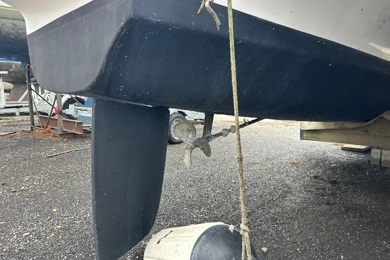 Slide: The Image of Underneath view of a 2014 Gemini Legacy 35 catamaran on a trailer. - 11