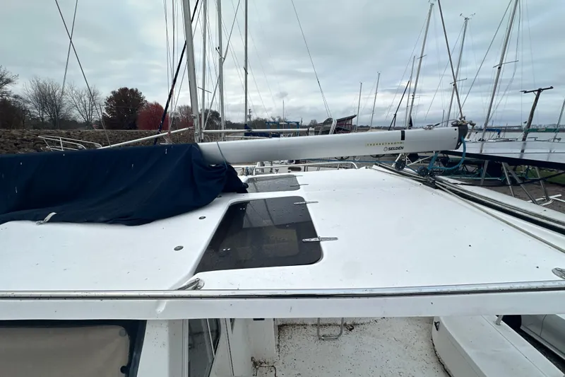 Slide: The Image of 2014 Gemini Legacy 35 boat cockpit with steering wheel and seating area. - 19