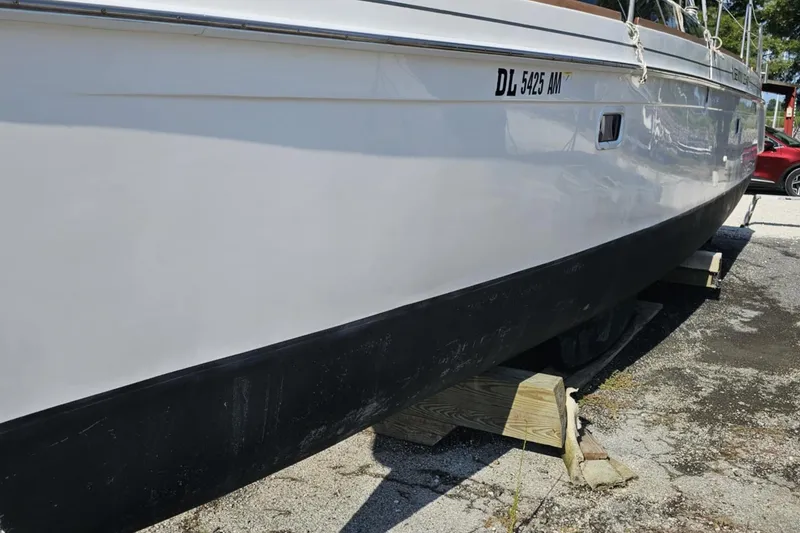 Slide: The Image of 2014 Gemini Legacy 35 catamaran on land, showcasing deck and hatches. - 3