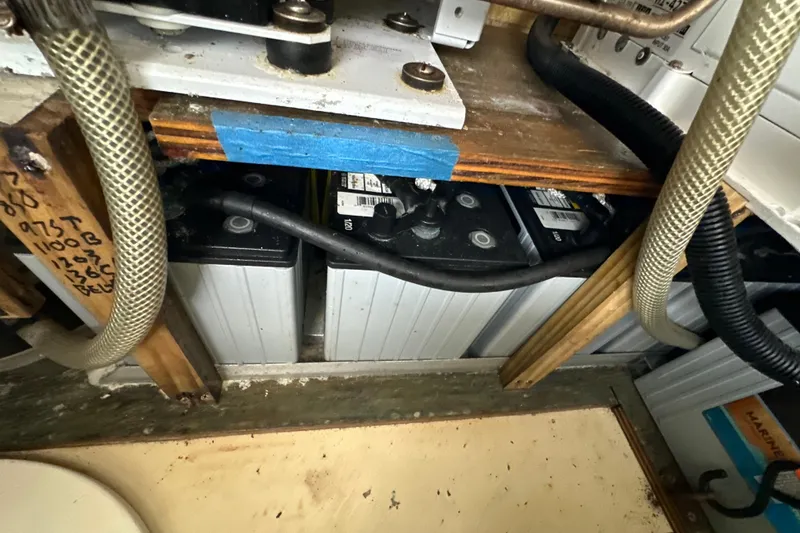 Slide: The Image of Yanmar engine gauge on 2014 Gemini Legacy 35, showing 1375 RPM with warning lights. - 51