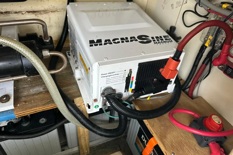 Slide: The Image of Electrical equipment and wiring inside a 2014 Gemini Legacy 35 boat. - 53