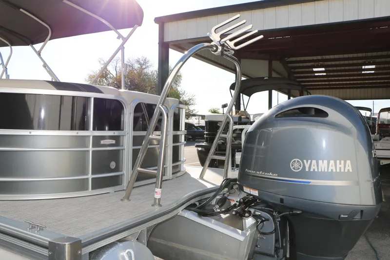 Slide: The Image of 2023 Sylvan Mirage X X3 Party Fish pontoon with Yamaha outboard motor. - 11