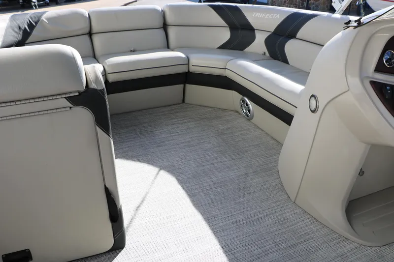 Slide: The Image of 2023 Sylvan Mirage X X3 Party Fish boat interior with plush seating and modern design. - 22