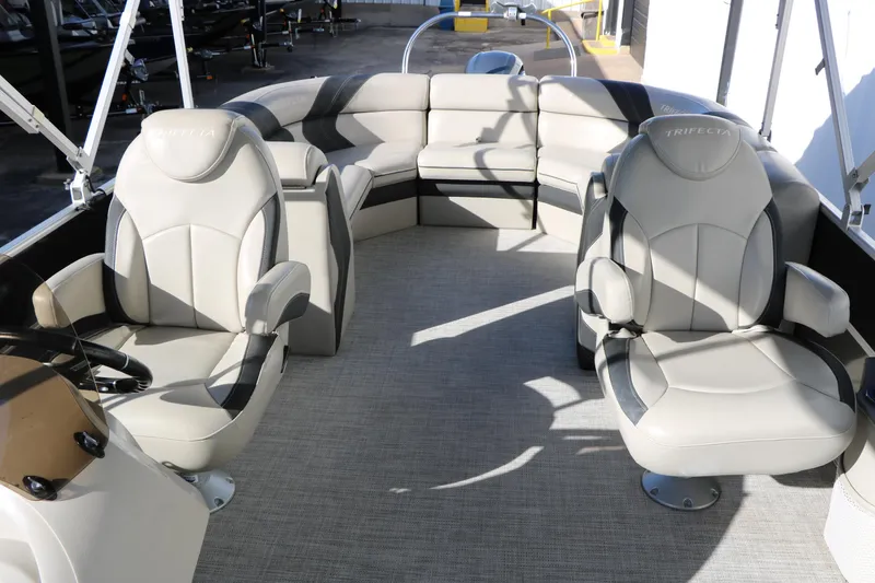 Slide: The Image of 2023 Sylvan Mirage X X3 Party Fish boat interior with plush seating and modern design. - 29