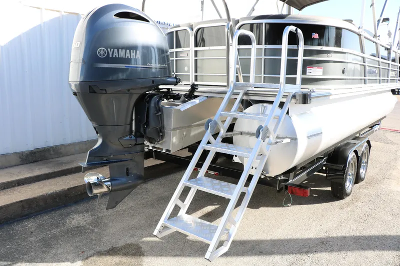 Slide: The Image of 2023 Sylvan Mirage X X3 Party Fish pontoon boat with Yamaha motor and ladder. - 9