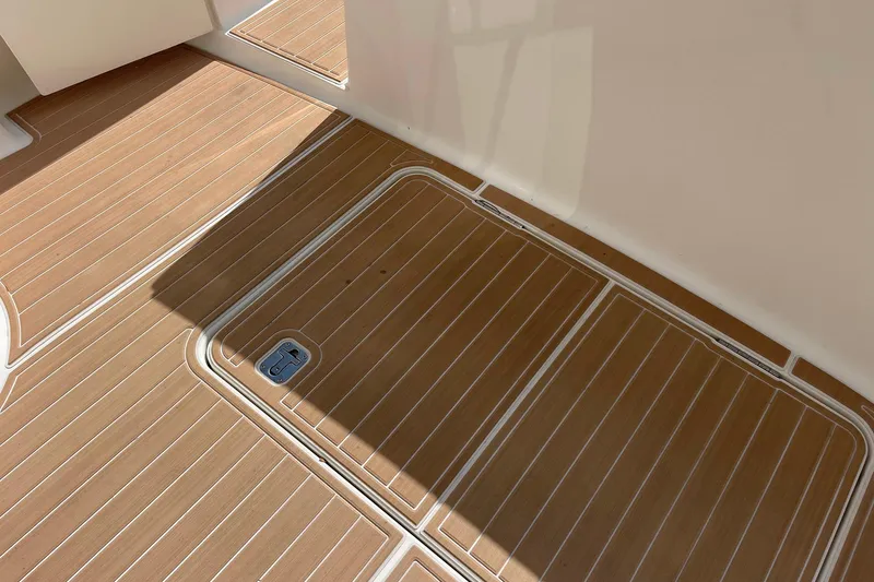 Slide: The Image of Teak deck flooring on 2005 Silverton 43 Sport Bridge yacht. - 27