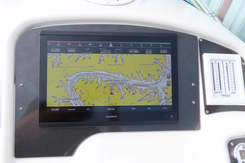 Slide: The Image of Garmin navigation display on 1999 Formula 382 FASTech boat dashboard. - 9