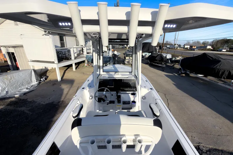 Slide: The Image of 2026 Tidewater 2110 Bay Max boat interior with modern console and seating. - 17