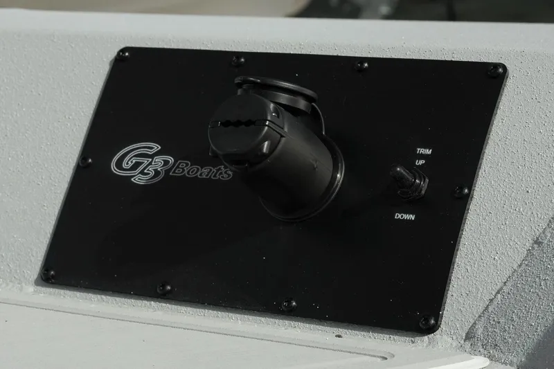 Slide: The Image of Control panel of G3 Bay 19 GX boat, featuring trim adjustment switch, 2026 model. - 10