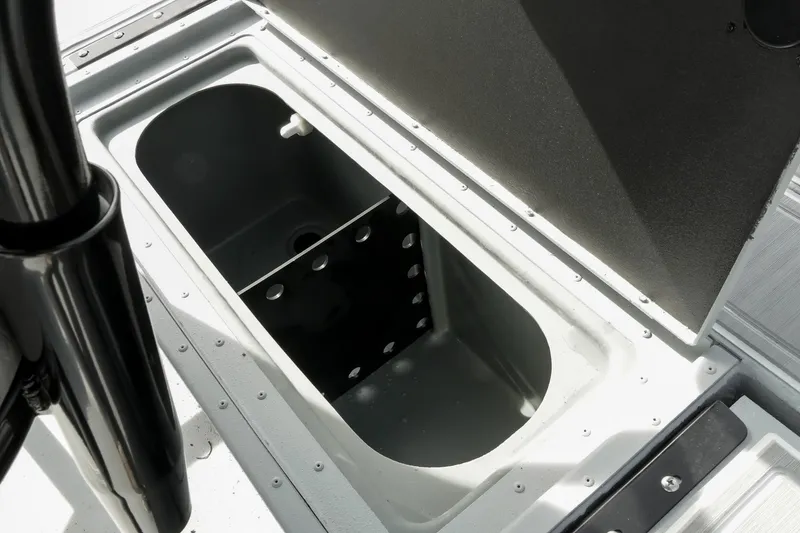Slide: The Image of Open storage compartment in 2026 G3 Bay 19 GX boat, showcasing interior design. - 19