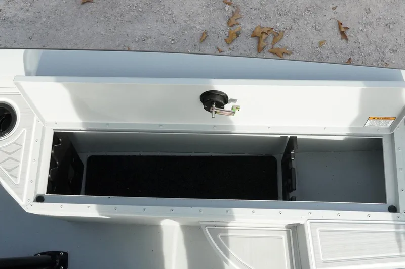 Slide: The Image of Open storage compartment on 2026 G3 Bay 19 GX boat, showing interior space. - 23