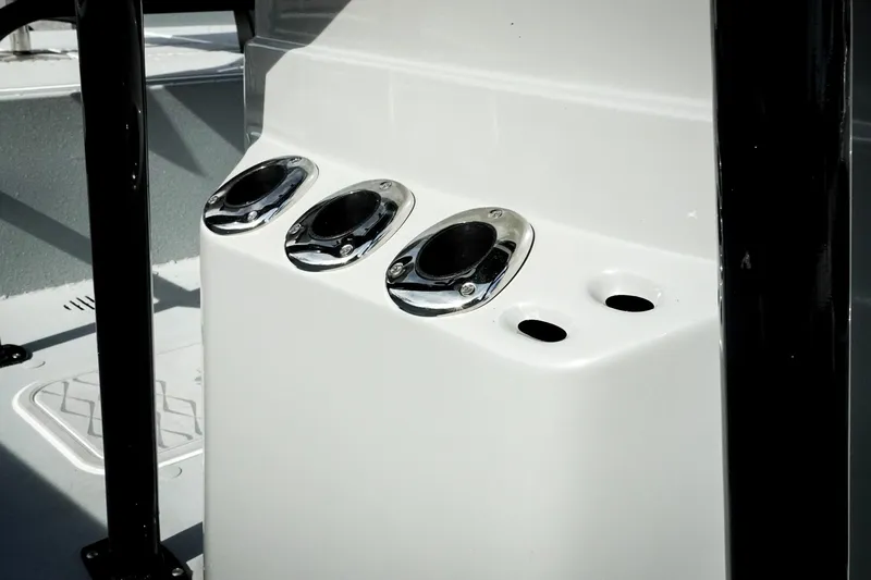 Slide: The Image of 2026 G3 Bay 19 GX boat console with rod holders and sleek design. - 9