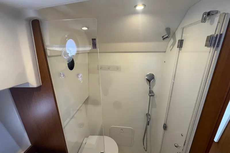 Slide: The Image of 2023 Beneteau Swift Trawler 35 bathroom with shower and modern fixtures. - 53