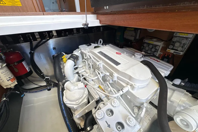Slide: The Image of Engine room of 2023 Beneteau Swift Trawler 35, showcasing detailed mechanical components. - 57