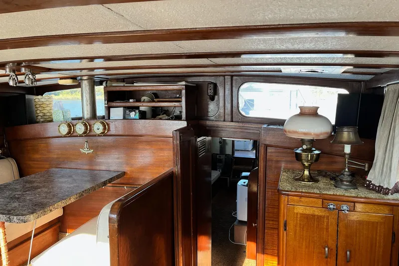 Slide: The Image of Interior of 1943 Shain-Monk 50 Twin Engine Classic Bridgedeck Cruiser with vintage decor. - 16
