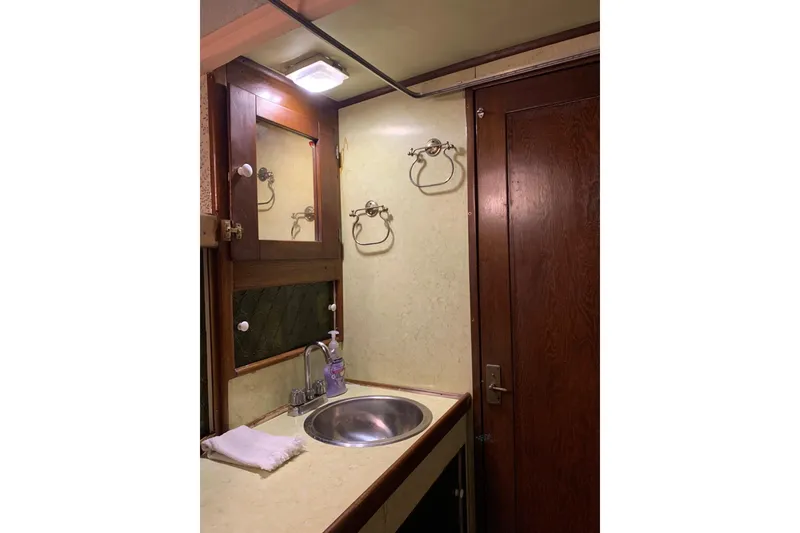 Slide: The Image of Bathroom interior of 1943 Shain-Monk 50 Twin Engine Classic Bridgedeck Cruiser. - 23