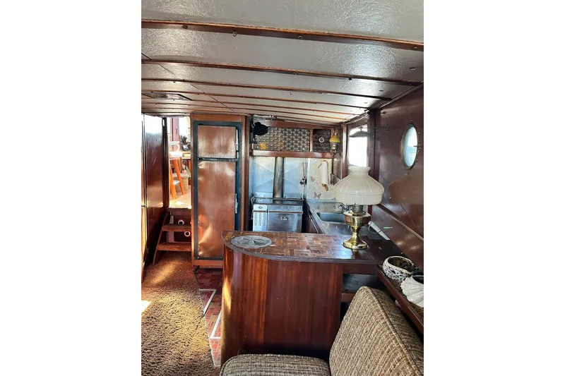 Slide: The Image of Interior of 1943 Shain-Monk 50 Twin Engine Classic Bridgedeck Cruiser with vintage decor. - 8