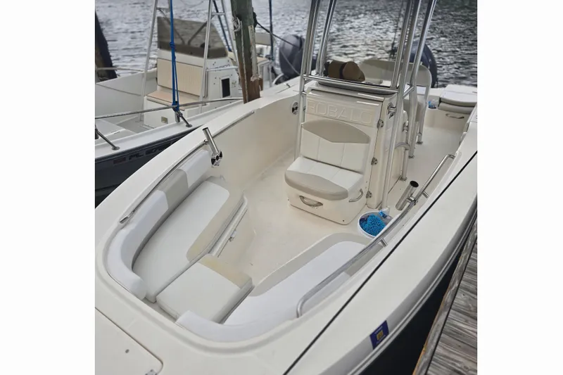 Slide: The Image of 2015 Robalo R200 Center Console boat interior with seating and console view. - 3