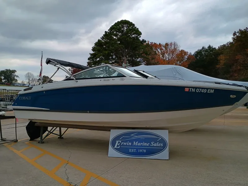 The Image of 2022 Cobalt R4 boat displayed at Erwin Marine Sales, blue and white exterior. - 0
