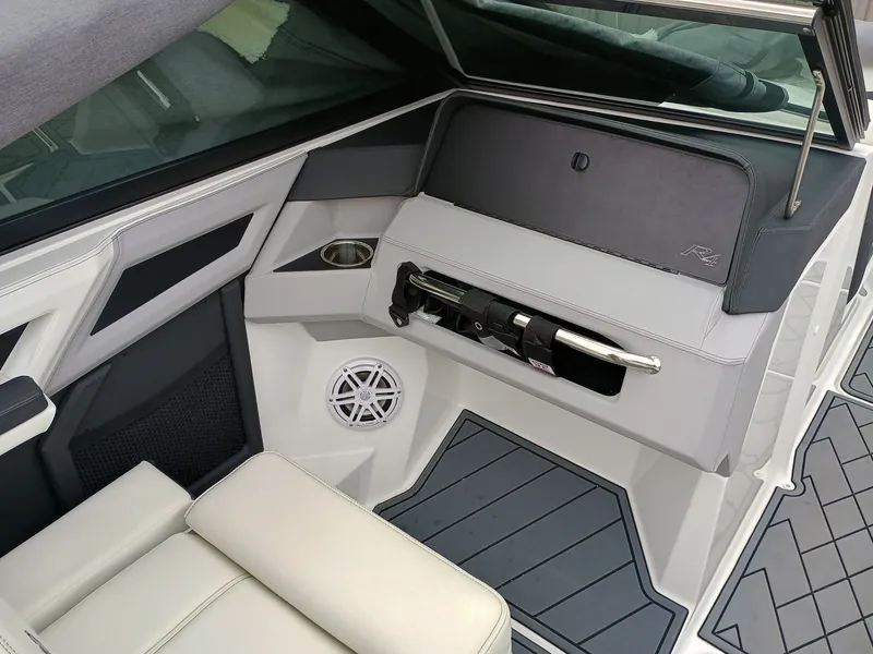 Slide: The Image of Interior of a 2022 Cobalt R4 boat, featuring sleek seating and modern design elements. - 4